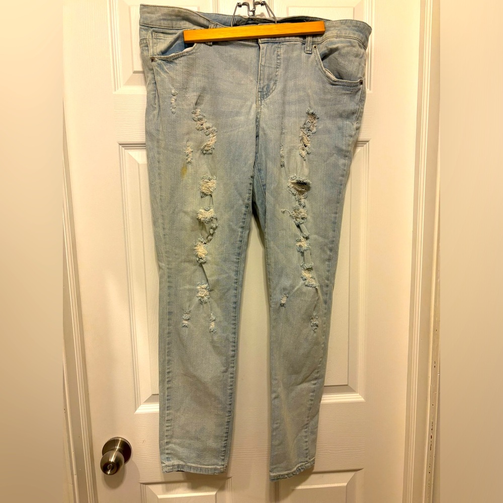 Distressed light denim jeans